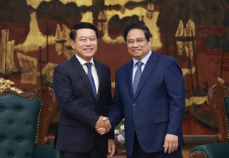  Vietnam willing to share experience in SOE reform with Laos: PM